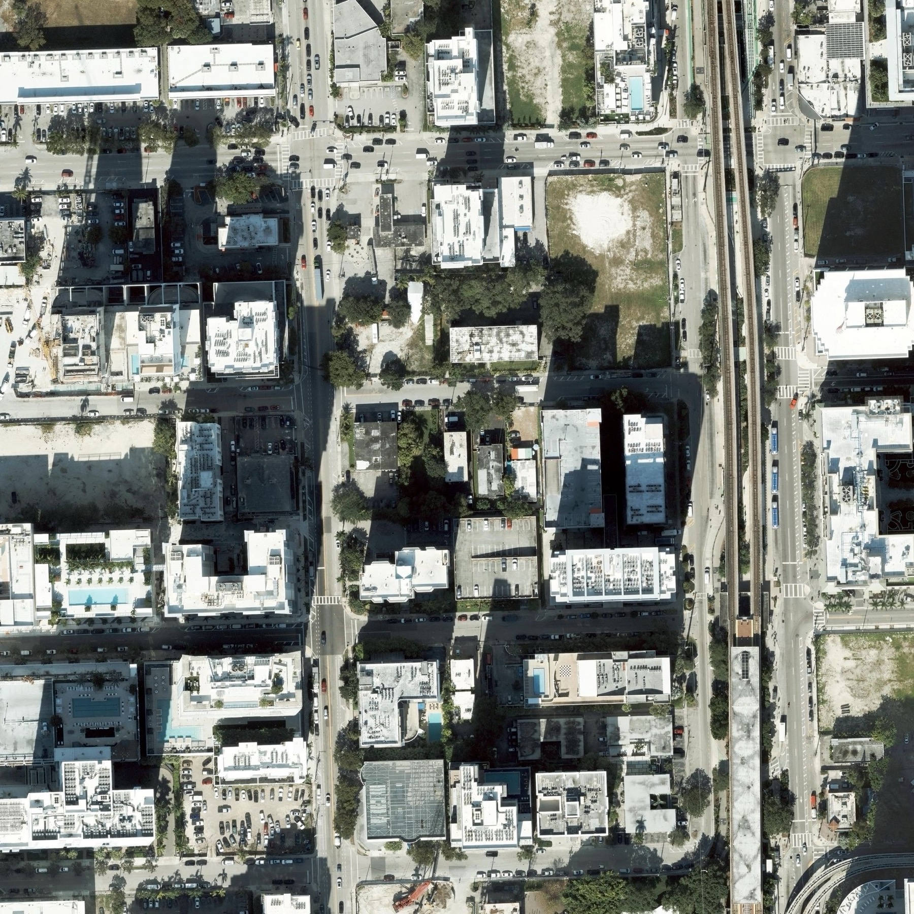 Aerial photograph of the House of Wellness site on SW 9th Street with the Brickell skyline beyond